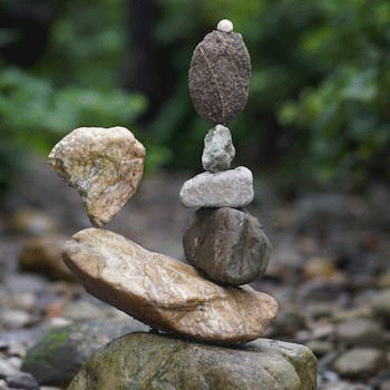 Balanced stones representing perseverance and achievement